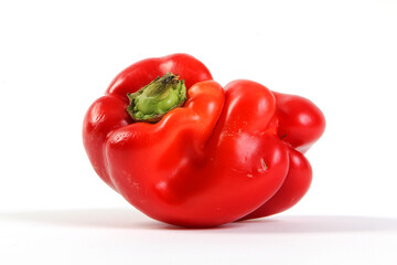 Red bell pepper with lips on white BG