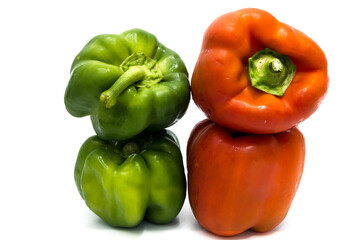 bell peppers isolated on white background. green and red bell peppers