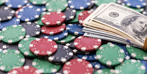 Poker combination with chips and win dollars in casino table. gambling