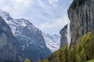 waterfall on a snowy valley