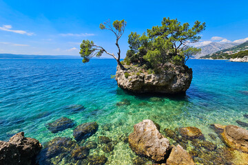 Islet at Punta Rata beach in Brela on Makarska riviera, Croatia