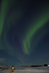 Naklejka premium aurora borealis over the mountains