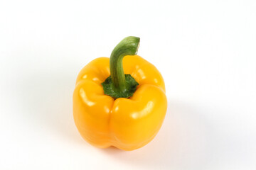 Yellow bell pepper with green stem on white BG