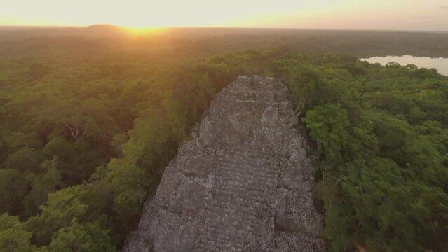 Aerial Drone View Yucatan Coba Mayan Pyramids Ruins at Sunset Mexico