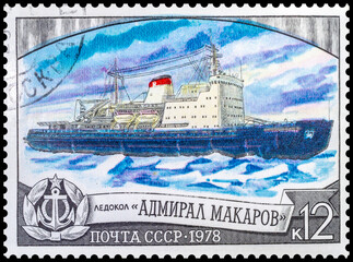 Icebreaker "Amguema". Postage stamp of the USSR in 1977. Isolated on black
