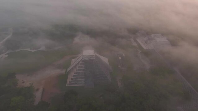 Aerial Drone View Yucatan Chichen Itza Mayan Pyramids Ruins at Sunrise Fog Mexico