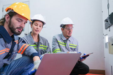 Professional engineer workers training and testing machine at industry factory. Concept people operation in industrial. Industry robot programming software for automated manufacturing technology.