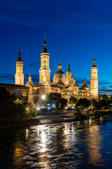  ebro river, in front of the Basilica del Pilar, with very low water level due to drought and climate change in Zaragoza, Spain