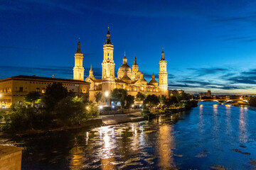  ebro river, in front of the Basilica del Pilar, with very low water level due to drought and climate change in Zaragoza, Spain