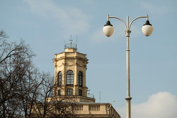 White streetlamp on the background of an old building. Minsk. Belarus
