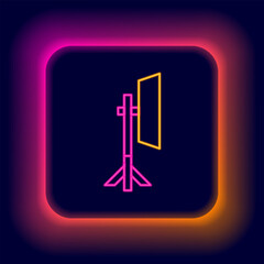 Glowing neon line Studio light bulb in softbox icon isolated on black background. Shadow reflection design. Colorful outline concept. Vector