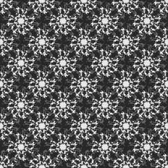 Ethnic black and white modern abstract Textile seamless pattern facture, texture background.Creative seamless abstract geometrical shape flower pattern. gray pattern with black background.