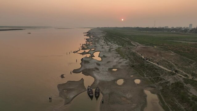 sunset over the river, Beautiful romantic sunset landscape drone view High quality video footage, padma river, rajshahi, bangladesh