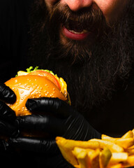 Junk food - Homemade bacon cheeseburger and French fries