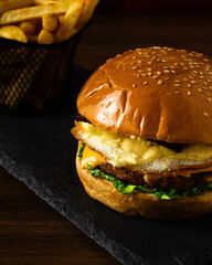 Junk food - Homemade bacon cheeseburger and French fries