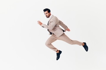 man beige smiling suit victory winner businessman attractive running business happy