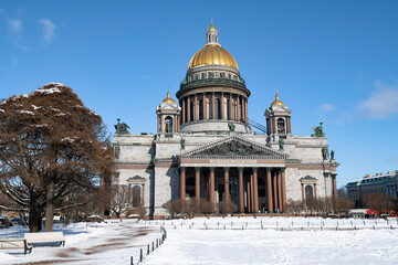 Fototapeta na wymiar Ancient St. Isaac's Cathedral on a sunny April day, Saint Petersburg
