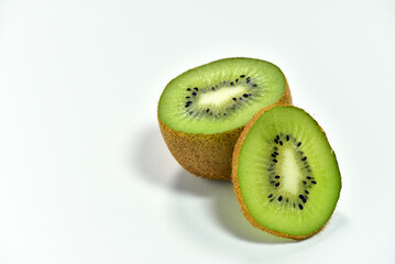 Slices of kiwifruit isolated on white background. High vitamin vegetables, fruits concept. For health and weight loss.