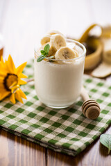 Sweet homemade yogurt with bananas and honey
