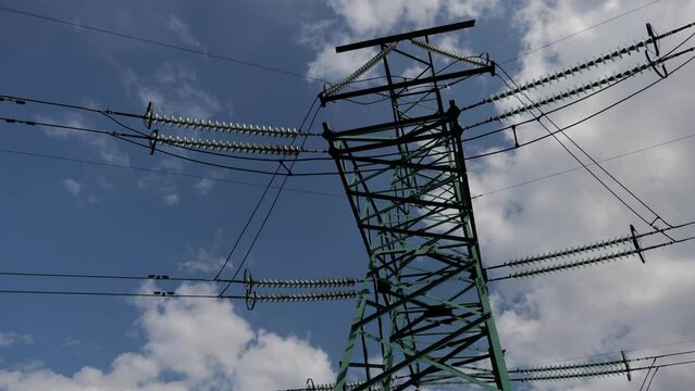 Electric transmission line with tower
