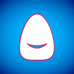 White Pouf icon isolated on blue background. Soft chair. Bag for the seat. Comfortable furniture armchair. Vector