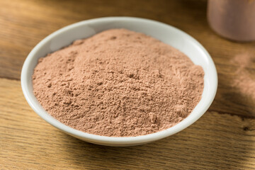 Fototapeta na wymiar Organic Chocolate Whey Protein Powder