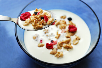 Breakfast cereal in a bowl with a spoon