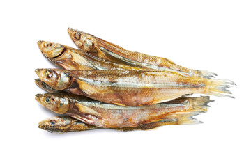 Dried smelt fish on a white
