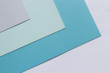 The paper blue colors is lying on the table