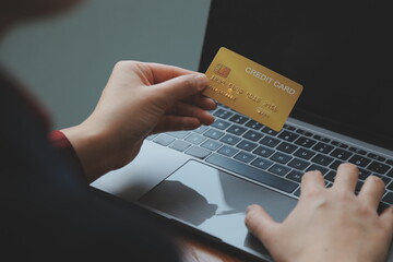 Women holding credit card and using smartphones at home.Online shopping, internet banking, store...