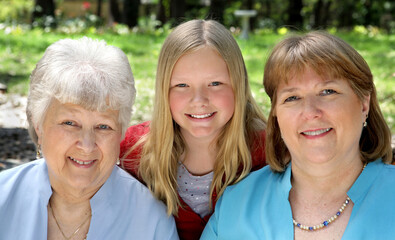 Three generation that look very much a like - a daughter, a mother, and a grandmother.