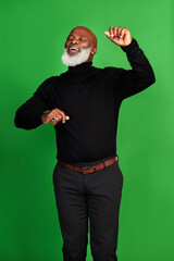 Happy, dance and smile with black man on green screen for celebration, music or excited. Happiness,...