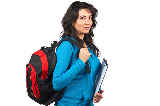 Young student woman with a black backpack on white background