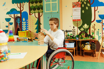 a girl with a nervous mental illness puts together a game in the classroom