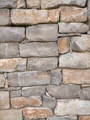 background of hand-carved stones of gray color embedded one with the other