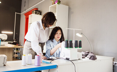 The designer teaches the seamstress the correct tailoring . The concept of creating clothes