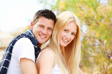 Fototapeta premium Young happy couple. Shallow DoF.