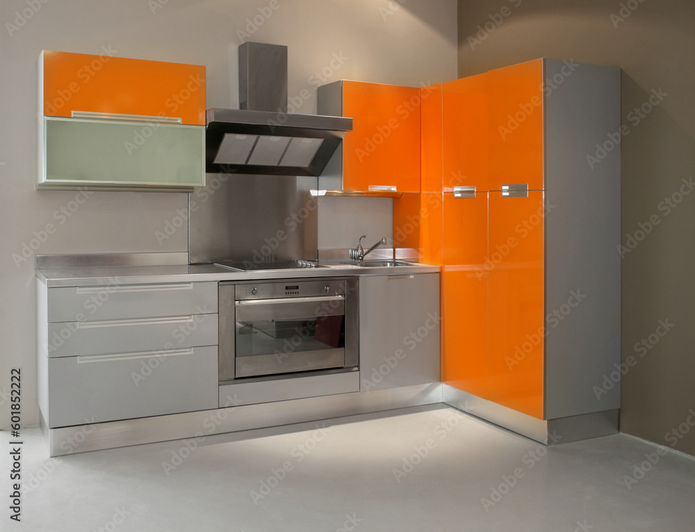 Wall mural new modern kitchen in orange with metal