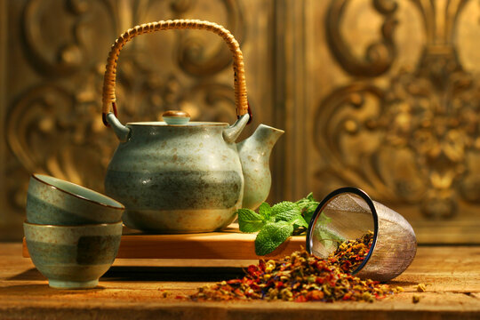 Asian herb tea on an old rustic table