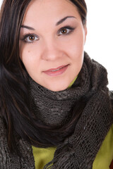 attractive brunette woman in winter clothes on white background