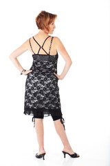 Beautiful adult caucasian woman with short streaked red hair in various poses, shot on a white background. Not Isolated, part of a series