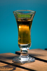 glass of drink on a blue background