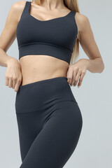 Fototapeta premium a girl in a white tracksuit on a white background