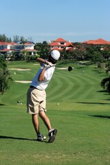 Golfer in action