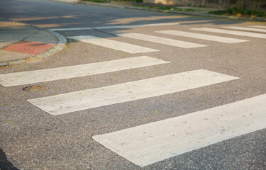 Crosswalk symbolizes pedestrian safety, accessibility, and shared spaces. It represents the...