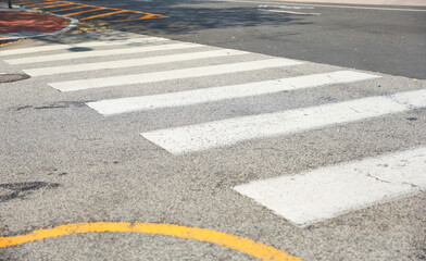 Crosswalk symbolizes pedestrian safety, accessibility, and shared spaces. It represents the...