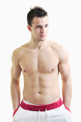 Fototapeta premium handsome young man with muscles and fit body isolated on white