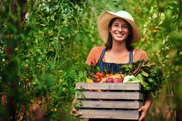 Farmer, agriculture and portrait of woman with box on farm after harvest of summer vegetables. Farming, female person and smile with crate of green product, food and agro in nature for sustainability - obrazy, fototapety, plakaty