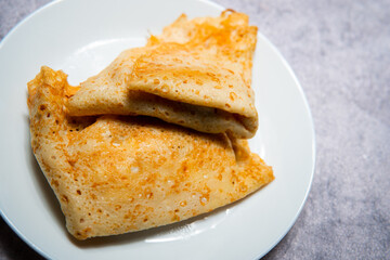 flat lay photo showing pancakes on a plate