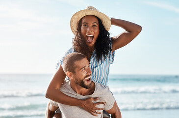 Beach, piggyback and excited woman with happy man on romantic summer holiday with waves and travel to ocean. Romance, happiness and couple at sea for adventure date on vacation together in Mexico.